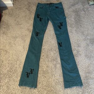 Stylish Teal Flare Jeans with Black Accents